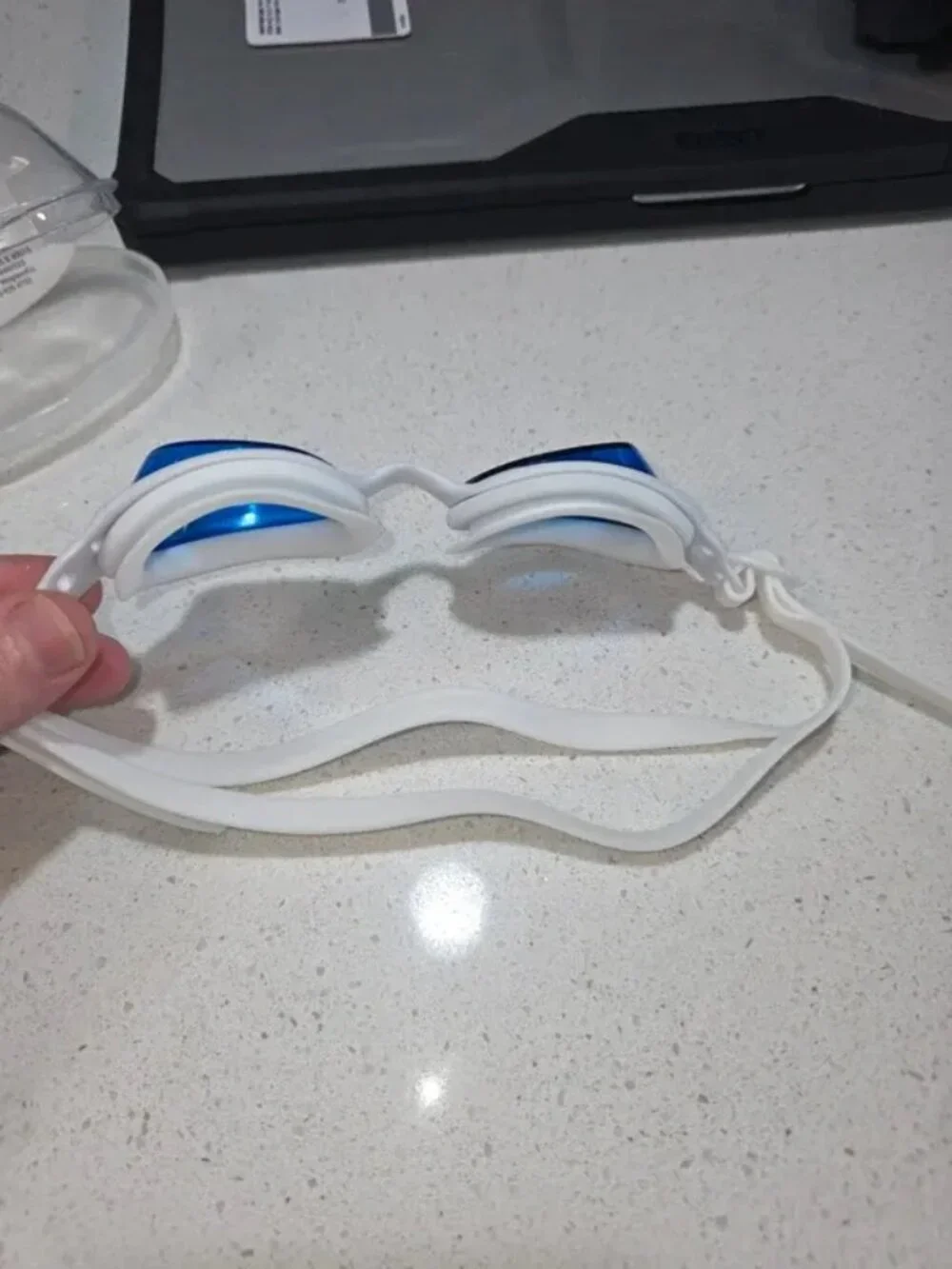 Silicone swim goggles with blue mirrored lenses, white frame, unisex racing styl